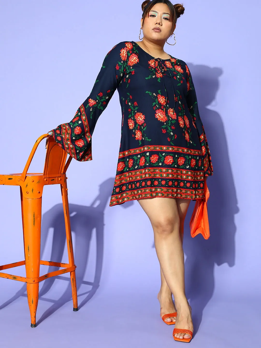 Berrylush Women Plus Size Navy Blue & Orange Floral Printed Tie-Up Neck Bell Sleeve Crepe Flared Mini Dress