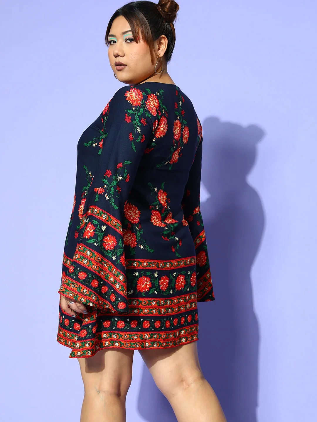 Berrylush Women Plus Size Navy Blue & Orange Floral Printed Tie-Up Neck Bell Sleeve Crepe Flared Mini Dress