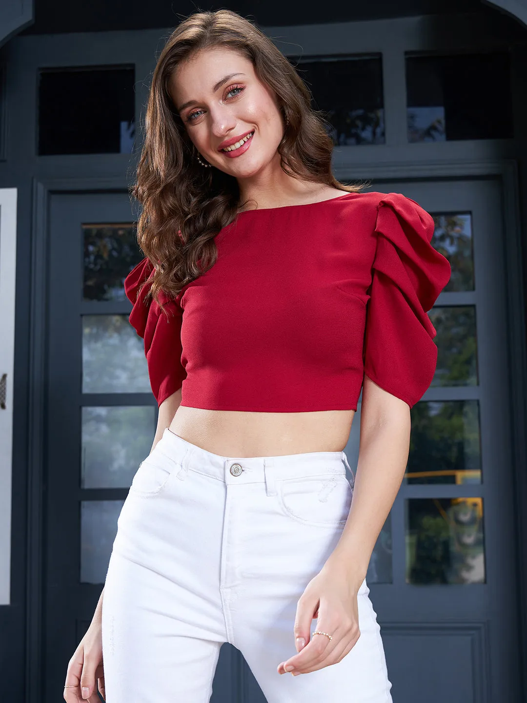 Berrylush Women Solid Red Round Neck Puff Sleeves Styled Tie-Up Back Crepe Cropped Top