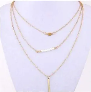 Delicately Layered Pearl and Gold Triple Chain Necklace