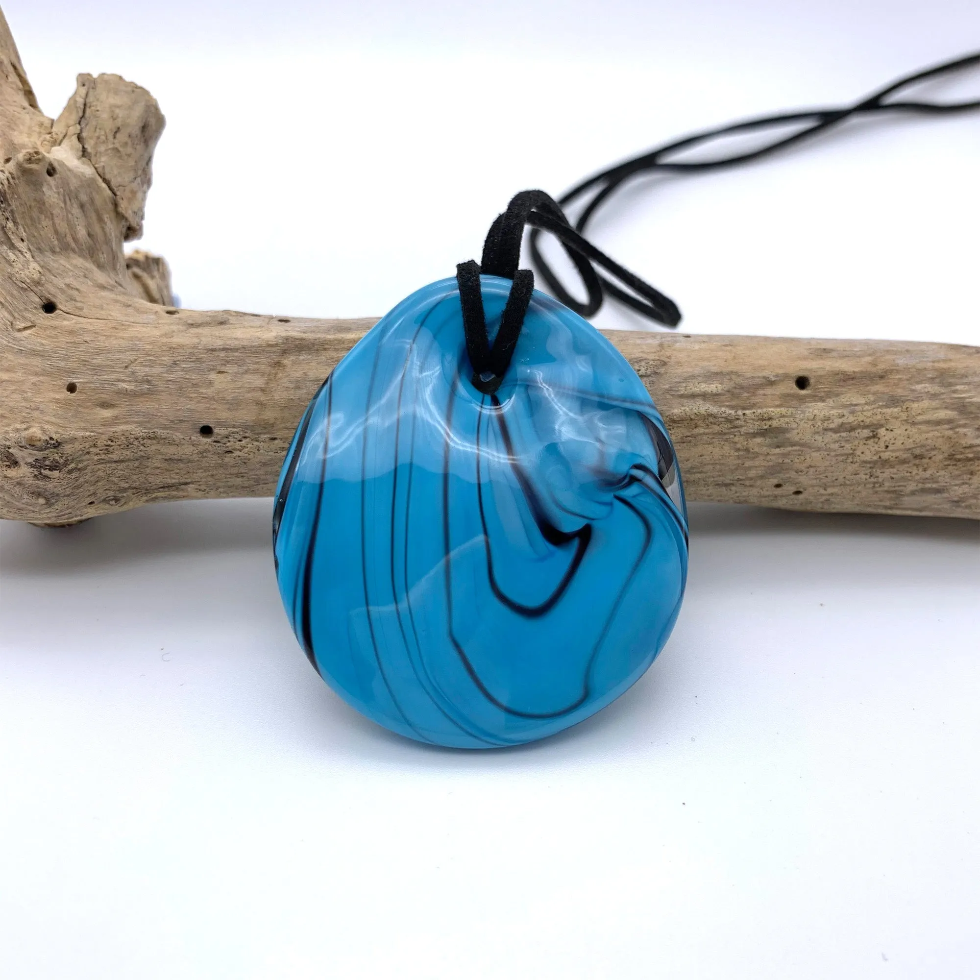 Necklace with blue pastel Murano glass near circular large flat pendant